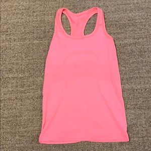Neon orange Lululemon tank top